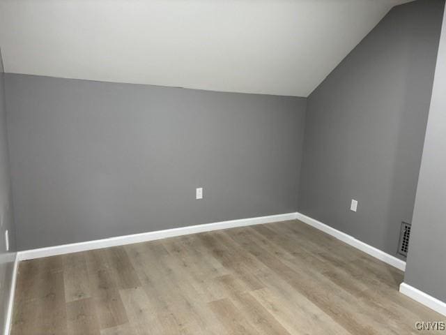 196 Berger Ave, Syracuse, NY 13205 - additional living space featuring vaulted ceiling and wood finished floors