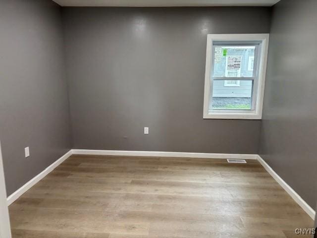 196 Berger Ave, Syracuse, NY 13205 - spare room featuring wood finished floors