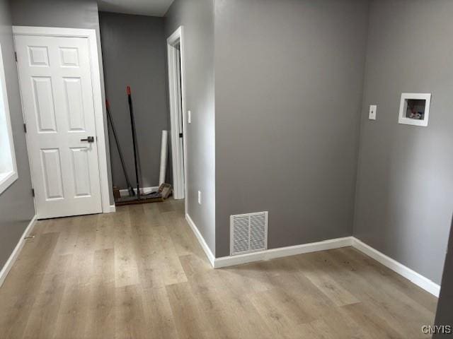 196 Berger Ave, Syracuse, NY 13205 - corridor featuring wood finished floors and baseboards