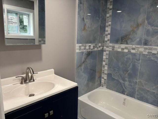 196 Berger Ave, Syracuse, NY 13205 - bathroom with vanity and washtub / shower combination