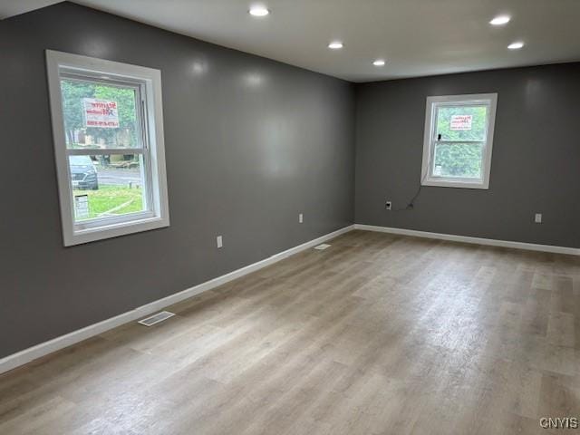 196 Berger Ave, Syracuse, NY 13205 - spare room featuring healthy amount of natural light, wood finished floors, and recessed lighting