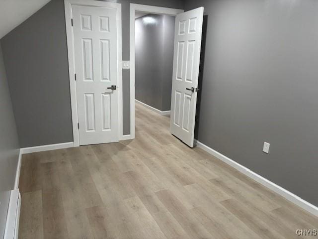 196 Berger Ave, Syracuse, NY 13205 - bonus room with a baseboard radiator and light wood-style floors