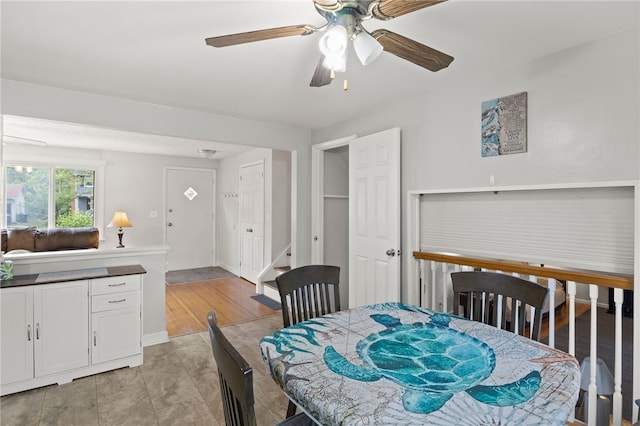 29 Davy Dr, Gates, NY 14624 - dining area with a ceiling fan and stairs