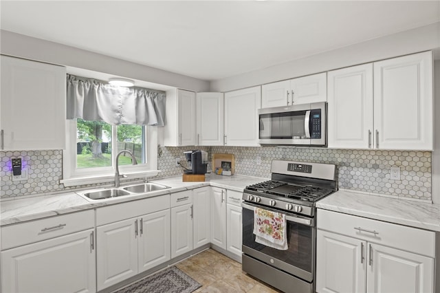 29 Davy Dr, Gates, NY 14624 - kitchen with stainless steel appliances and white cabinetry