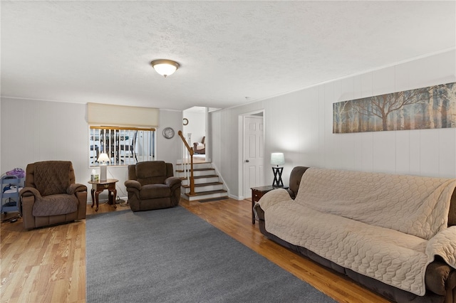 29 Davy Dr, Gates, NY 14624 - living room featuring wood finished floors and stairway