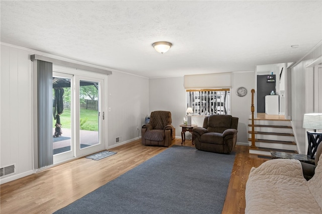 29 Davy Dr, Gates, NY 14624 - living room with wood finished floors and ornamental molding