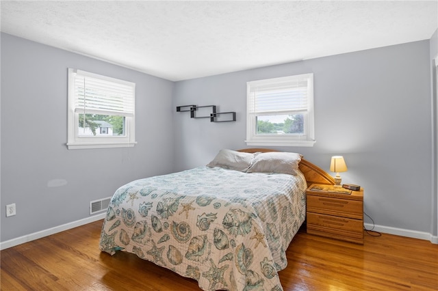 29 Davy Dr, Gates, NY 14624 - bedroom with wood finished floors and baseboards