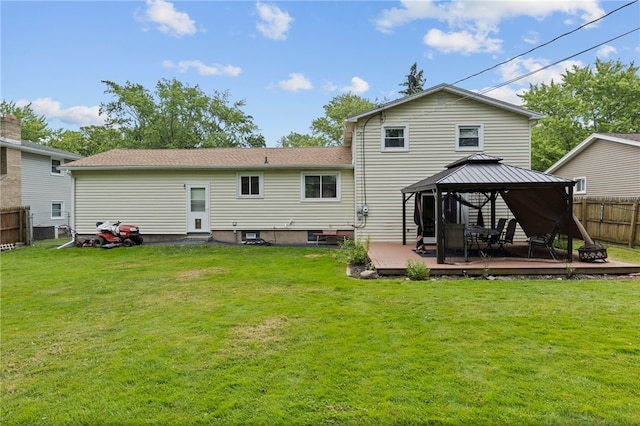 29 Davy Dr, Gates, NY 14624 - back of property with a gazebo, a fenced backyard, and a deck