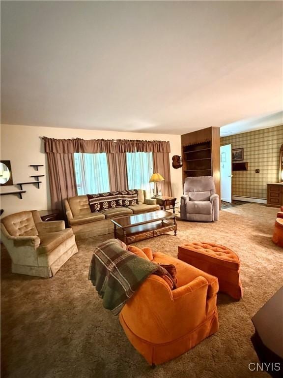 9418 Glenmore Rd Unit Es, Annsville, NY 13471 - carpeted living area featuring wallpapered walls and a baseboard radiator
