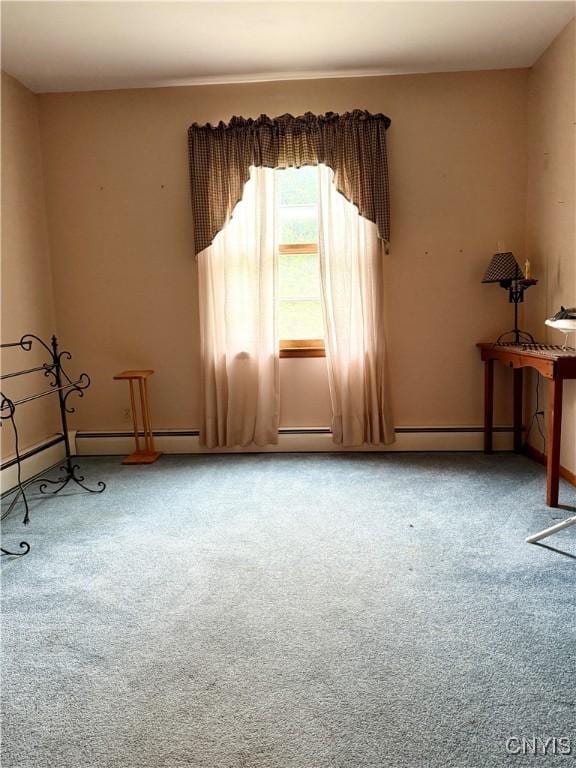 9418 Glenmore Rd Unit Es, Annsville, NY 13471 - carpeted spare room with a baseboard radiator and baseboards