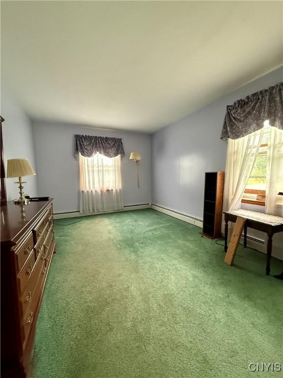 9418 Glenmore Rd Unit Es, Annsville, NY 13471 - unfurnished living room featuring carpet floors