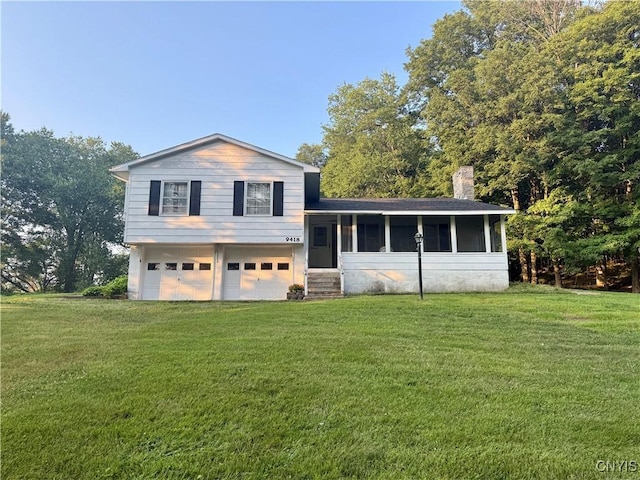 9418 Glenmore Rd Unit Es, Annsville, NY 13471 - split level home with a garage, a front yard, a sunroom, and a chimney