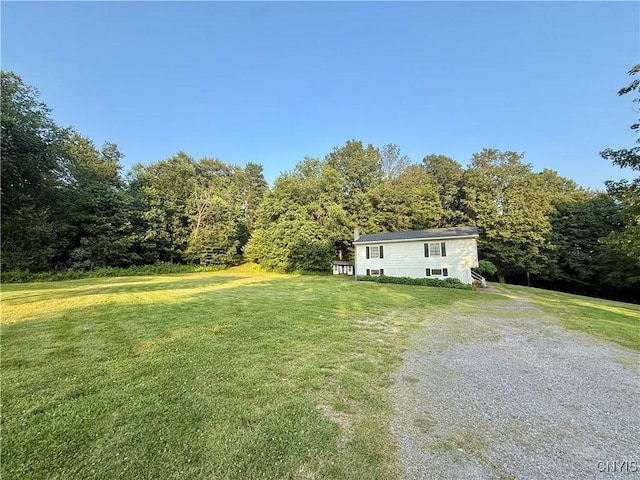 9418 Glenmore Rd Unit Es, Annsville, NY 13471 - view of grassy yard with a view of trees