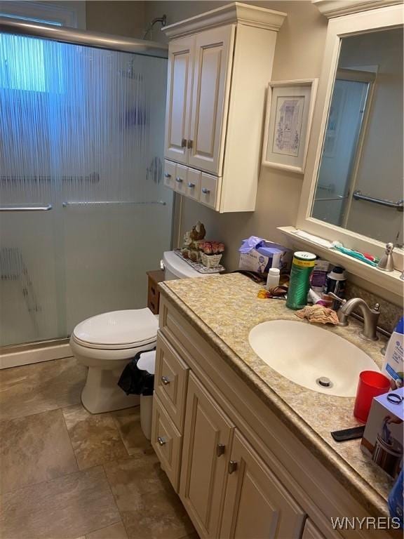 14 Princess Ln, West Seneca, NY 14224 - bathroom with a shower stall, vanity, and stone finish floors