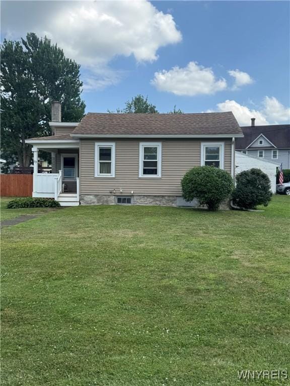 29 Church St, Royalton, NY 14105 - view of front facade with a front lawn, a chimney, and a porch