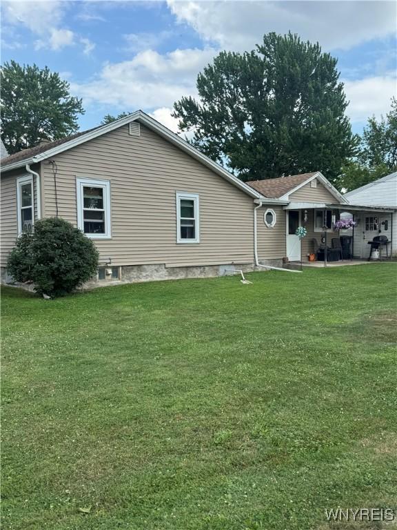 29 Church St, Royalton, NY 14105 - view of front facade with a front yard
