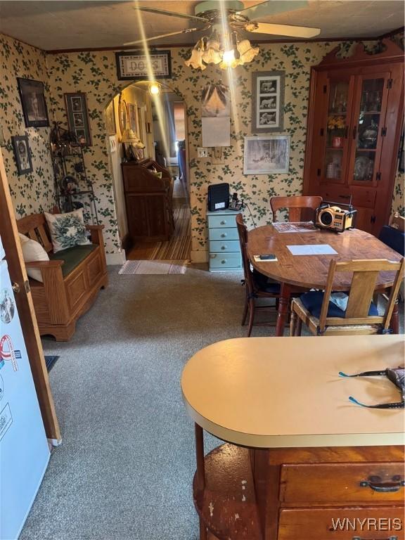 29 Church St, Royalton, NY 14105 - carpeted dining room featuring wallpapered walls and ceiling fan