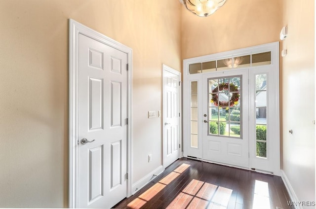 171 Harbridge Mnr, Amherst, NY 14221 - entryway with dark wood-style floors and baseboards