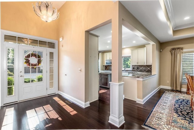 171 Harbridge Mnr, Amherst, NY 14221 - entryway featuring dark wood-style flooring and a chandelier