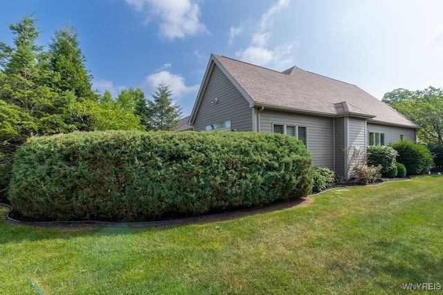 171 Harbridge Mnr, Amherst, NY 14221 - view of side of property featuring a yard and roof with shingles