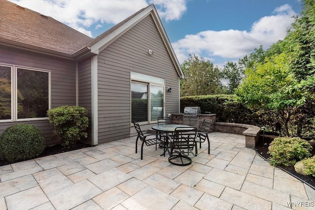 171 Harbridge Mnr, Amherst, NY 14221 - view of patio with exterior kitchen and outdoor dining space
