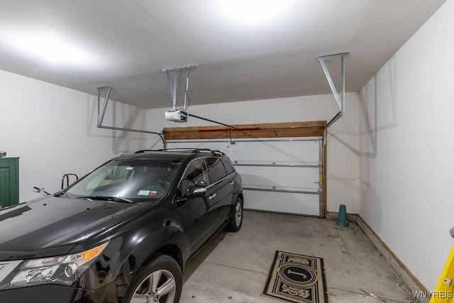 171 Harbridge Mnr, Amherst, NY 14221 - garage featuring a garage door opener