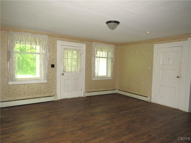 164 Kanzog Rd, German Flatts, NY 13407 - foyer featuring baseboard heating, wallpapered walls, and dark wood-style flooring
