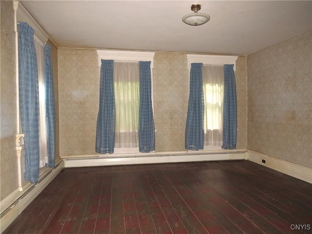 164 Kanzog Rd, German Flatts, NY 13407 - empty room with wood-type flooring and baseboard heating