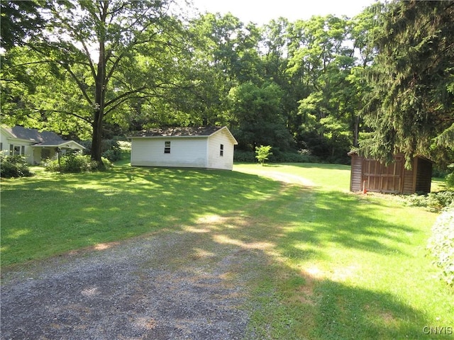 164 Kanzog Rd, German Flatts, NY 13407 - view of grassy yard featuring a shed