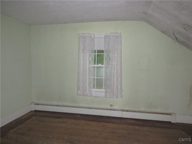 164 Kanzog Rd, German Flatts, NY 13407 - bonus room with a baseboard radiator, wood finished floors, and vaulted ceiling