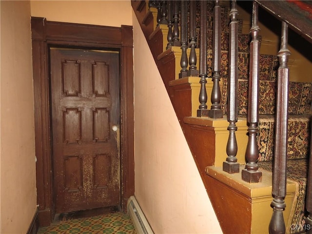 164 Kanzog Rd, German Flatts, NY 13407 - staircase with a baseboard heating unit