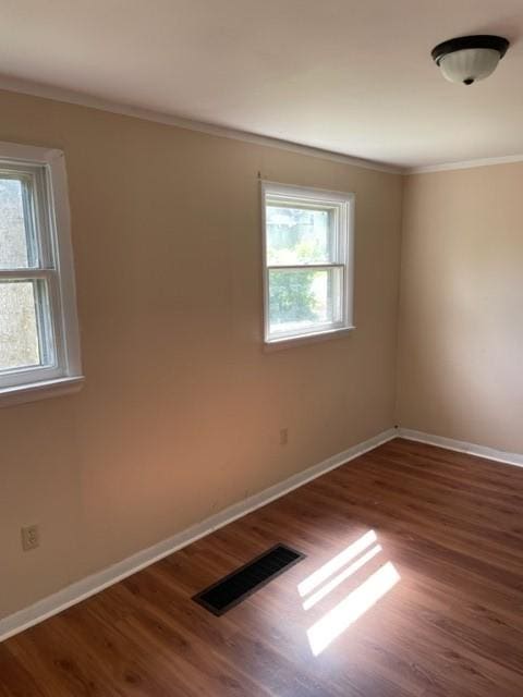 1307 Lackawanna Ave, Elmira City, NY 14901 - empty room with ornamental molding and wood finished floors