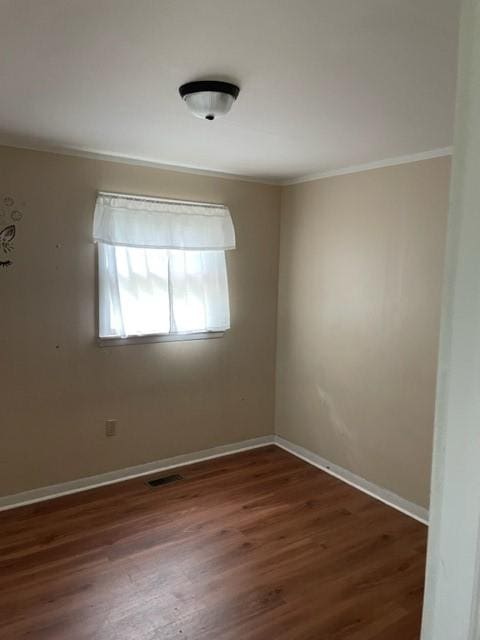1307 Lackawanna Ave, Elmira City, NY 14901 - empty room featuring crown molding and wood finished floors