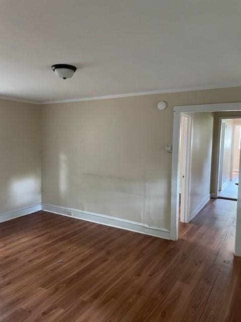 1307 Lackawanna Ave, Elmira City, NY 14901 - spare room featuring ornamental molding, dark wood finished floors, and a smoke detector
