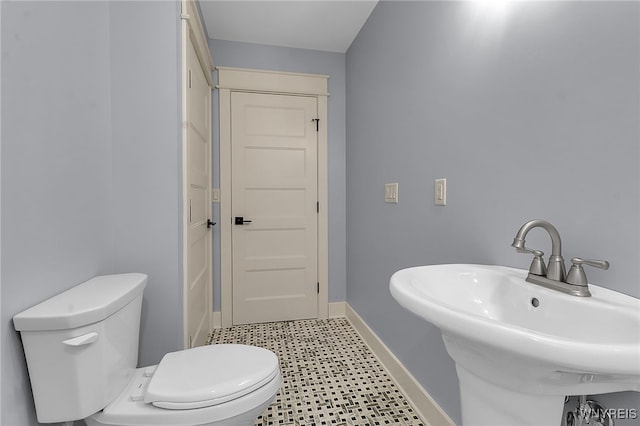 4221 Upper Mountain Rd, Cambria, NY 14132 - half bath featuring tile patterned floors and toilet