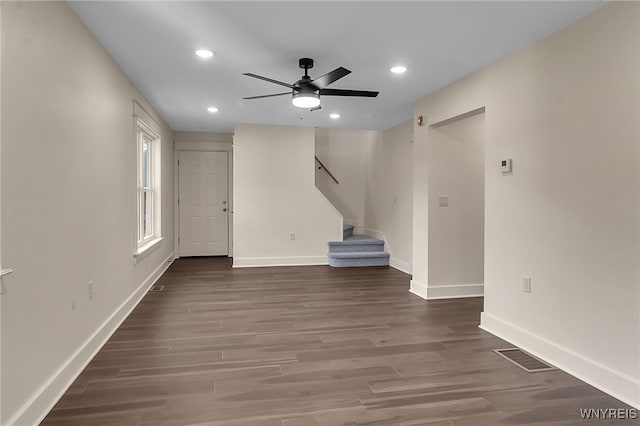 4221 Upper Mountain Rd, Cambria, NY 14132 - unfurnished living room featuring a ceiling fan, recessed lighting, stairway, and wood finished floors