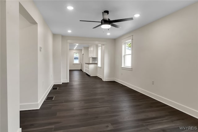 4221 Upper Mountain Rd, Cambria, NY 14132 - unfurnished living room featuring ceiling fan, dark wood-type flooring, and recessed lighting