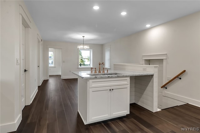4221 Upper Mountain Rd, Cambria, NY 14132 - kitchen featuring dark wood-type flooring, white cabinetry, pendant lighting, light stone countertops, and recessed lighting