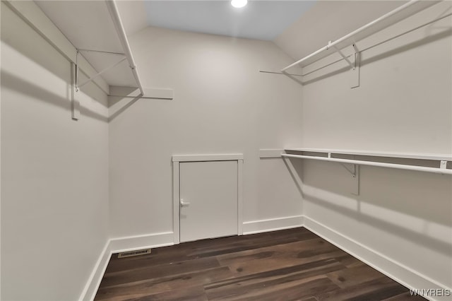 4221 Upper Mountain Rd, Cambria, NY 14132 - walk in closet featuring dark wood-type flooring and lofted ceiling