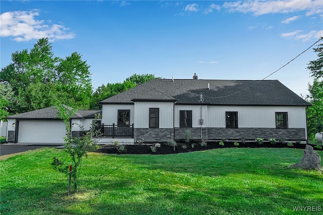 4221 Upper Mountain Rd, Cambria, NY 14132 - modern farmhouse style home featuring stone siding, driveway, a front yard, and a chimney
