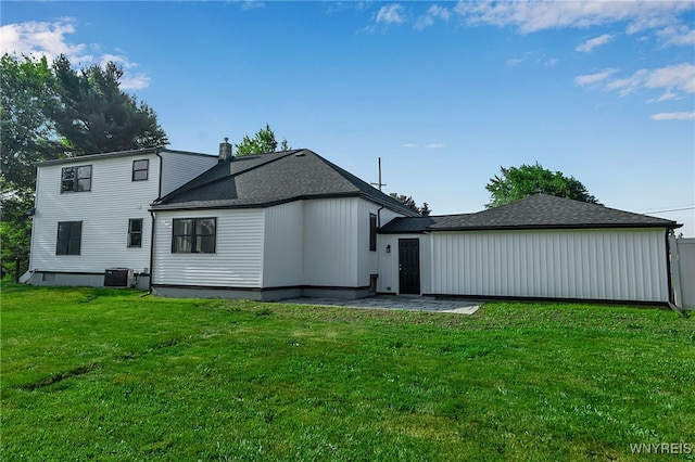 4221 Upper Mountain Rd, Cambria, NY 14132 - back of house with a yard, a patio, and a shingled roof