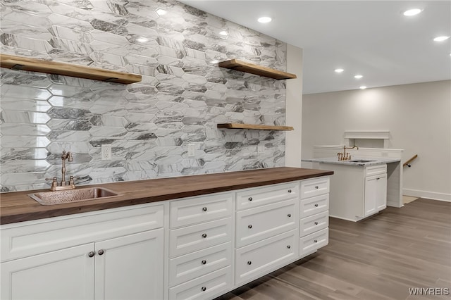 4221 Upper Mountain Rd, Cambria, NY 14132 - kitchen with wood counters, open shelves, recessed lighting, white cabinetry, and dark wood-style flooring