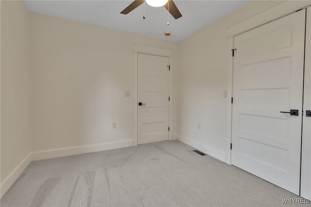 4221 Upper Mountain Rd, Cambria, NY 14132 - unfurnished bedroom with light colored carpet and a ceiling fan