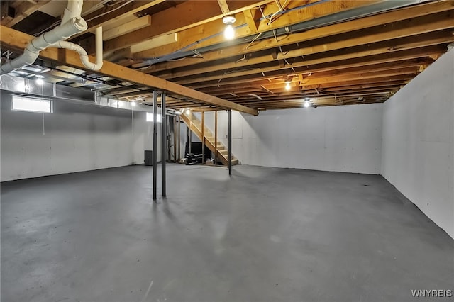 4221 Upper Mountain Rd, Cambria, NY 14132 - unfinished basement with stairs