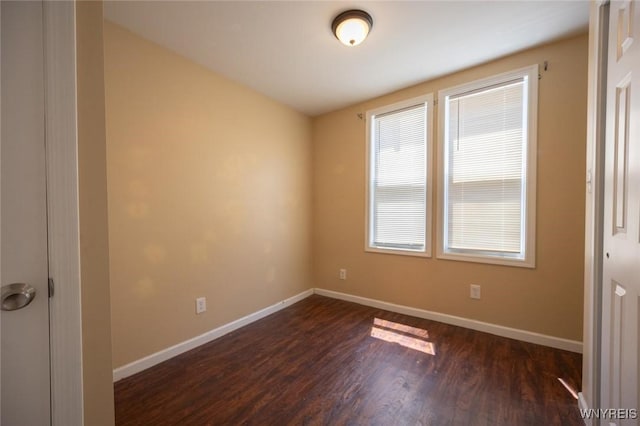 54 Tuxedo Pl, Buffalo, NY 14207 - spare room with dark wood-style flooring and baseboards