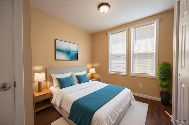 54 Tuxedo Pl, Buffalo, NY 14207 - bedroom featuring baseboards and dark wood-style flooring