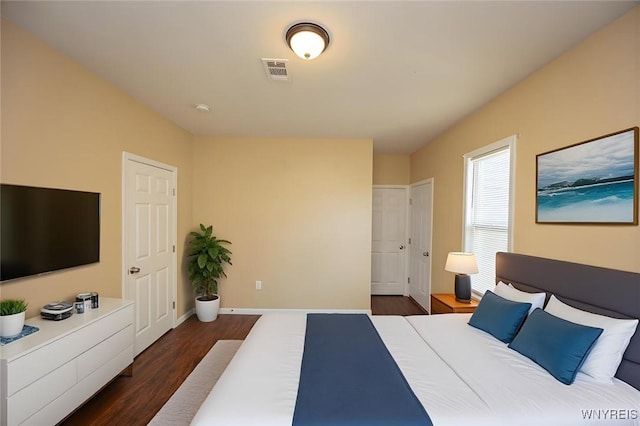 54 Tuxedo Pl, Buffalo, NY 14207 - bedroom with dark wood-style floors and baseboards