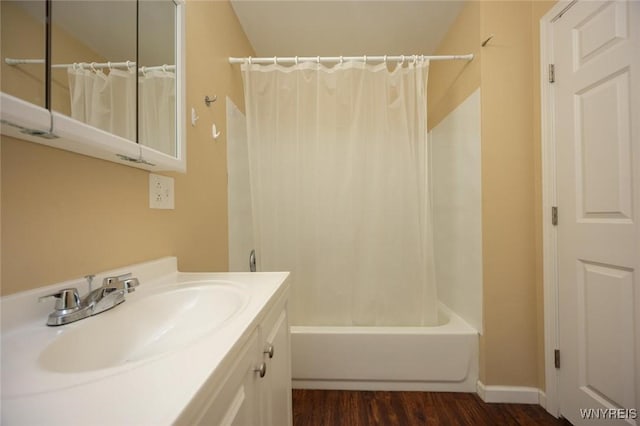 54 Tuxedo Pl, Buffalo, NY 14207 - full bathroom featuring wood finished floors, shower / tub combo with curtain, and vanity