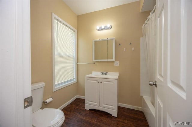 54 Tuxedo Pl, Buffalo, NY 14207 - bathroom with vanity, wood finished floors, a shower with shower curtain, and a tub