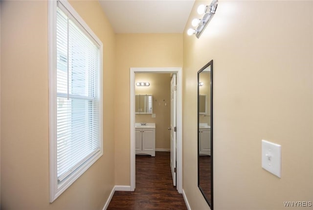 54 Tuxedo Pl, Buffalo, NY 14207 - corridor featuring dark wood finished floors and baseboards